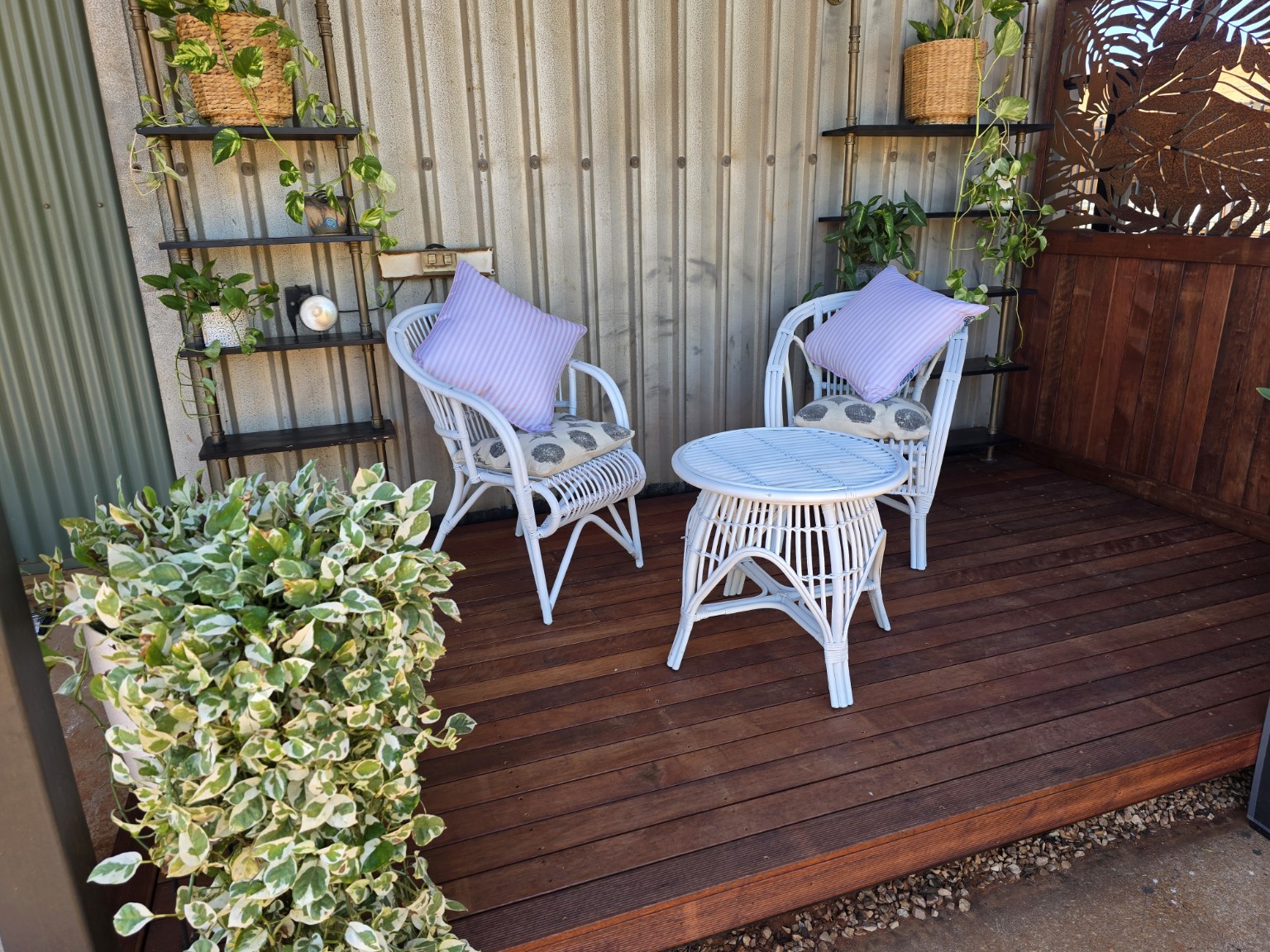 The leafy outdoor seating area at Sonder Atelier